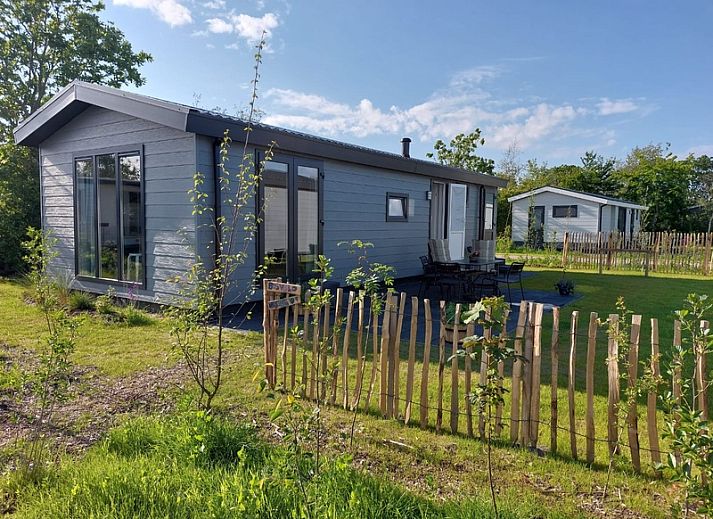 Vakantiepark de Bremakker - Bosveld 146, ein charmantes Ferienhaus in De Dennen, Texel, umgeben von gruener Natur und Ruhe.