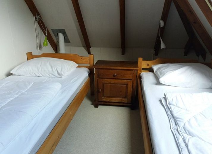 Gezellige woonkamer van Bollenveld - de Iris, vakantiehuis in De Dennen, Texel met comfortabele zitruimte.