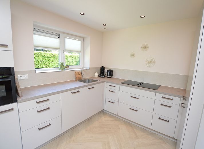 Gemuetliches Wohnzimmer im Bungalow 't Hoogelandt 58, Ferienhaus in De Dennen Texel.