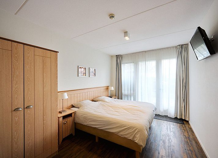 Gezellige woonkamer in Wellness Appartement voor 5 personen, Midsland, Terschelling. Comfortabel vakantiehuis op de Waddeneilanden.