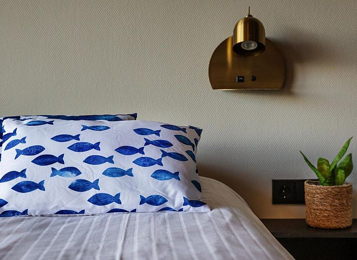 Luxe binnenruimte van Deluxe Studio voor 2 personen in Midsland, Terschelling. Moderne inrichting met uitzicht op de natuur van de Waddeneilanden.