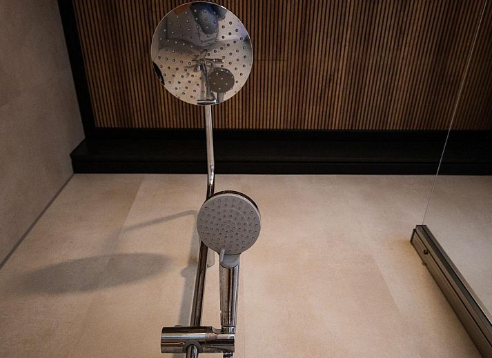 Stijlvolle binnenruimte van Deluxe Studio voor 2 in Midsland, Terschelling met moderne inrichting en gezellige sfeer.