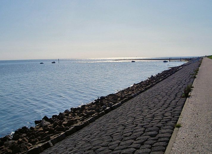 Bright living room of Apartment Jelle, Oosterend, Terschelling with comfortable seating.