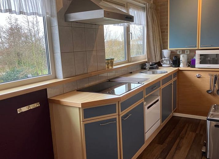 Schlafzimmer mit zwei Betten im Ferienhaus in Oosterend, Terschelling.