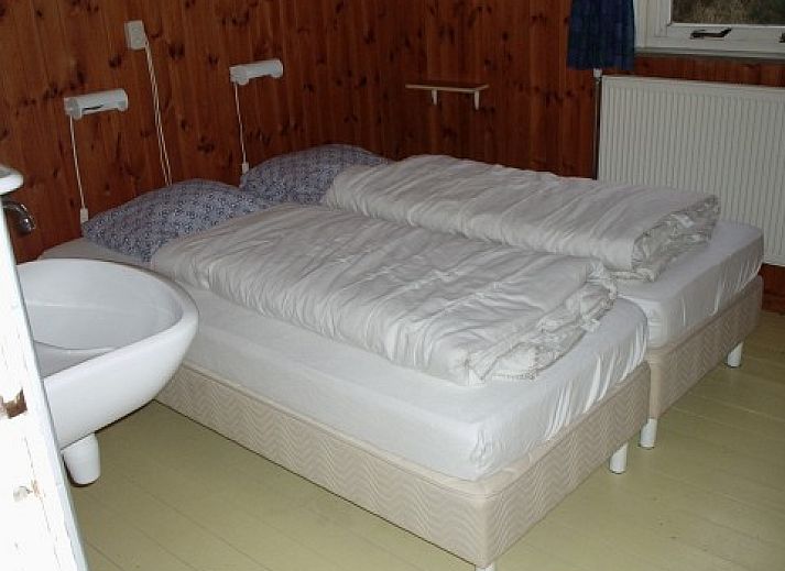 Gemuetliches Wohnzimmer der Karbonkel mit Blick auf die Duenen in Midsland aan Zee, Terschelling.