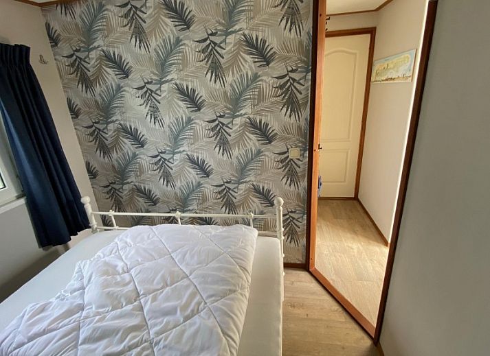 Terras met picknicktafel bij De Clochard nr 37 chalet in Midsland Noord, Terschelling.