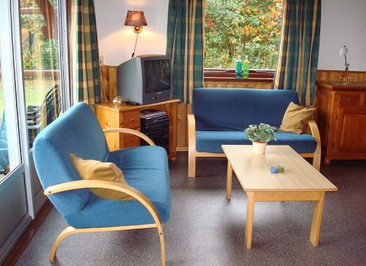 Ingang van vakantiehuis Brunel in Midsland Noord, Terschelling, met houten hek.