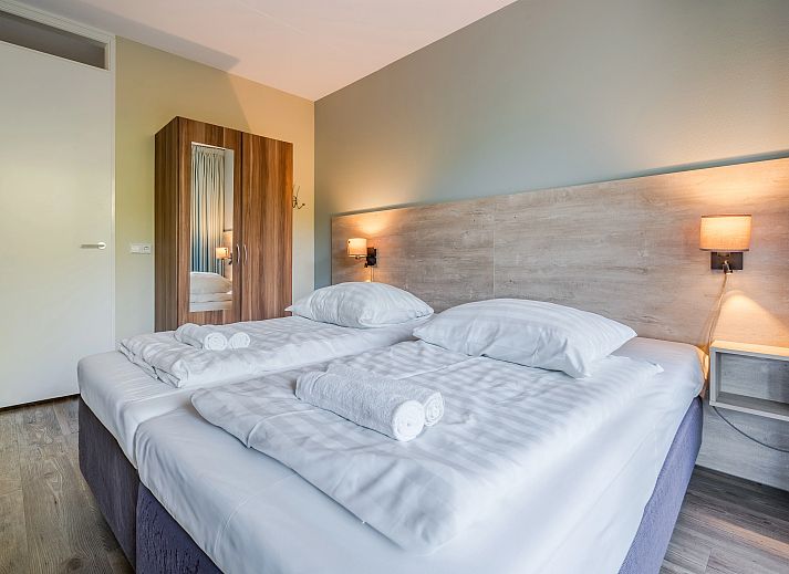 Ruime zithoek met uitzicht op groen in West Terschelling 6-persoons appartement 6LA, Terschelling, Waddeneilanden.