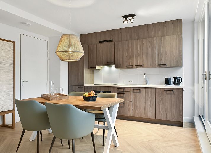 Enjoy the view from the terrace of the 4-person penthouse 4CP in West Terschelling, Wadden Islands.