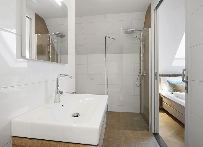 Stijlvolle zithoek in 4-6-persoons penthouse 4-6LP, West-Terschelling, perfect voor ontspanning.