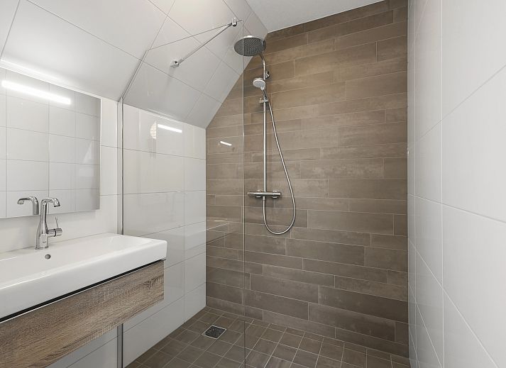 Stijlvolle zithoek in 4-6-persoons penthouse 4-6LP, West-Terschelling, perfect voor ontspanning.