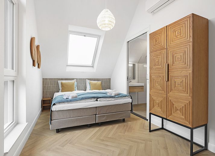 Stijlvolle zithoek in 4-6-persoons penthouse 4-6LP, West-Terschelling, perfect voor ontspanning.