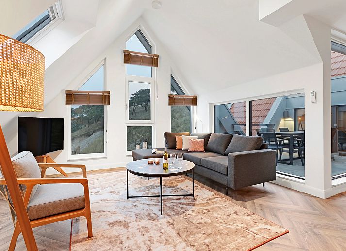 Cozy living room in 6-person penthouse 6LP, West-Terschelling, overlooking nature.