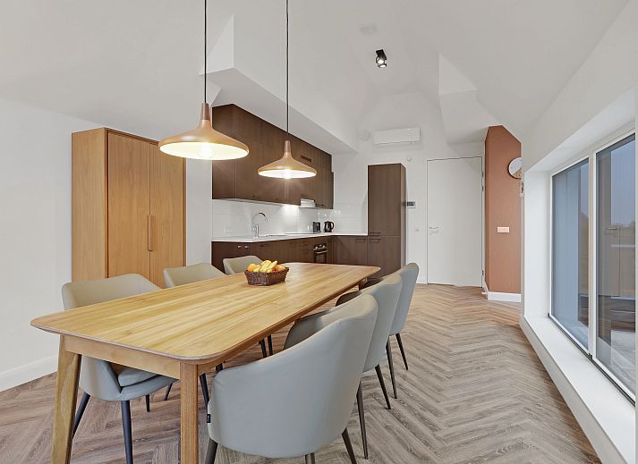 Comfortable sitting area in vacation home 6LP in West Terschelling, ideal for relaxation.