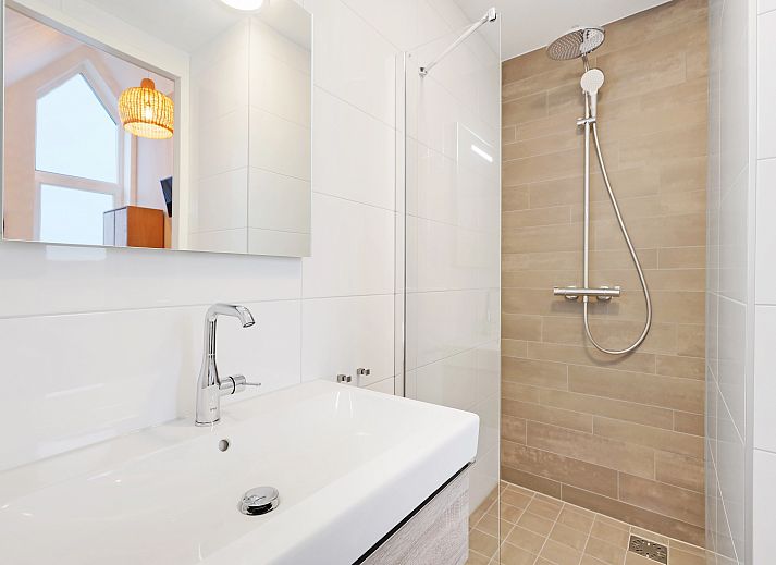 Comfortable sitting area in vacation home 6LP in West Terschelling, ideal for relaxation.