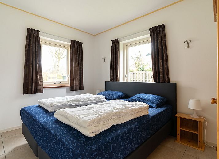 Gezellige woonkamer in vakantiehuis Laurier, Ballum, Ameland met comfortabele zithoek.