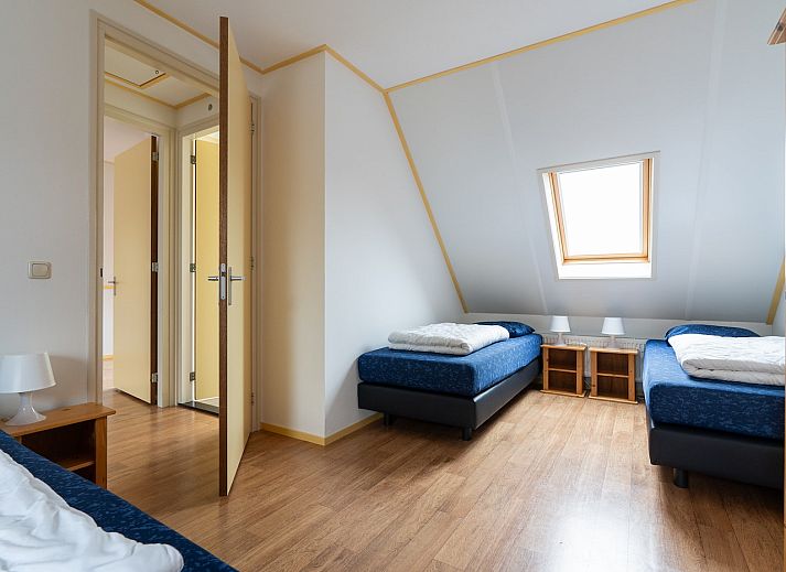 Gezellige woonkamer in vakantiehuis Laurier, Ballum, Ameland met comfortabele zithoek.