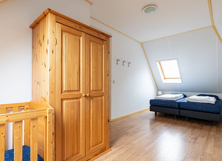 Gezellige woonkamer in vakantiehuis Laurier, Ballum, Ameland met comfortabele zithoek.