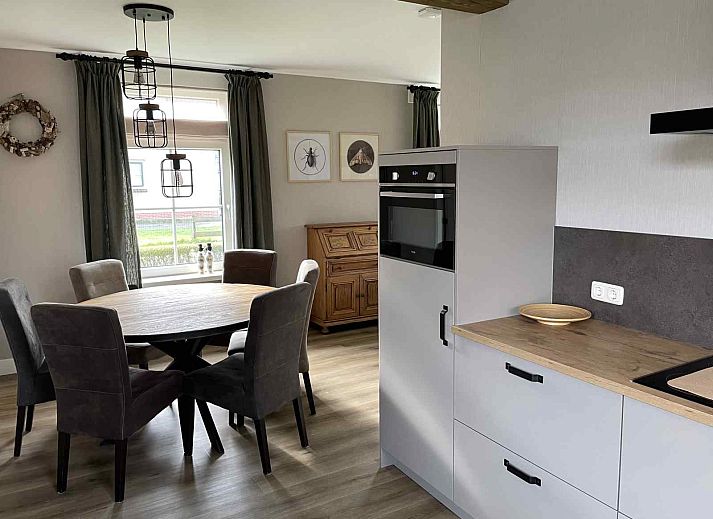 WA003 vacation home in Buren, Ameland with traditional architecture and green surroundings.