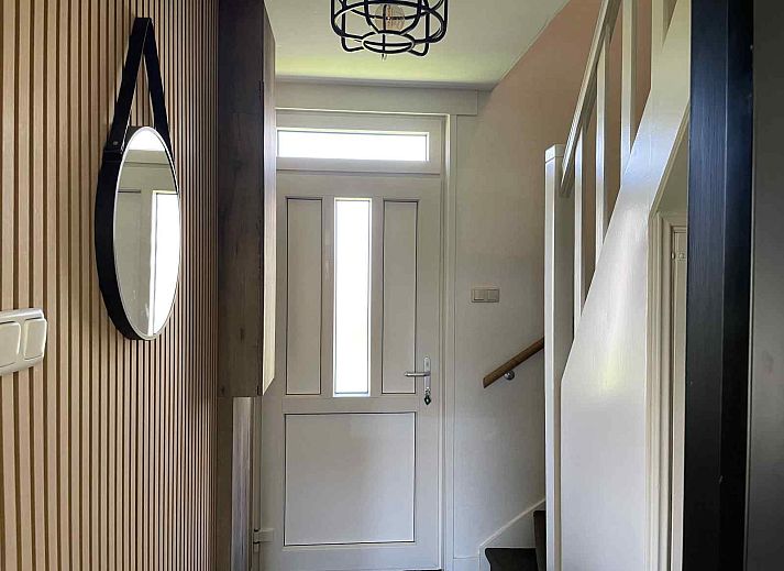 WA003 vacation home in Buren, Ameland with traditional architecture and green surroundings.