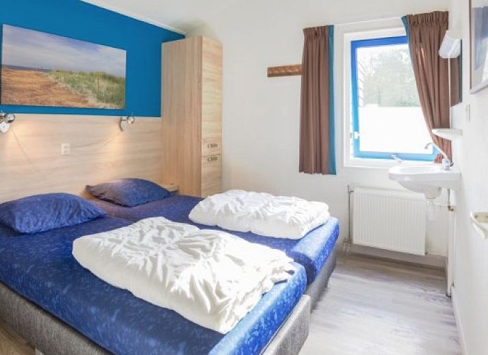 BORNRIF COTTAGE 4 in Hollum, Ameland mit sonniger Terrasse und gruener Umgebung.