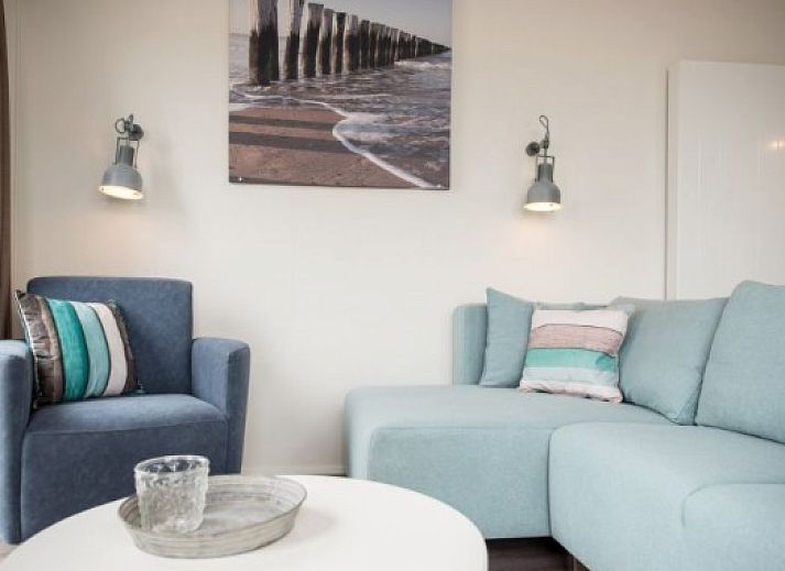 Stylish kitchen and dining area in AMELANDLODGE 4, a vacation home in Hollum, Ameland, ideal for cozy meals.