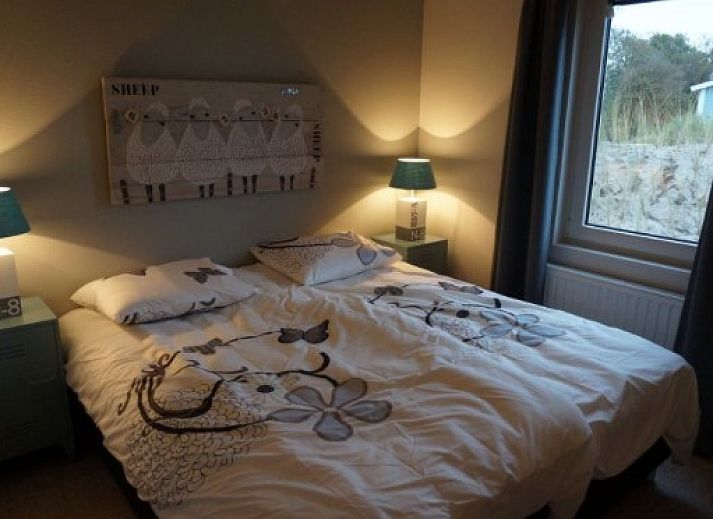 EILANDLODGE 4 vakantiehuis met veranda in Hollum, Ameland omgeven door natuur.