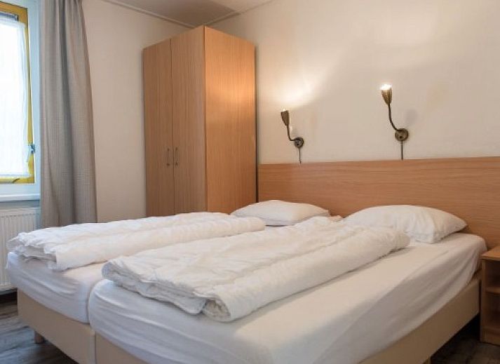 DUINBUNGALOW 4 in Hollum, Ameland mit grosser Terrasse und gruener Umgebung auf den Watteninseln.