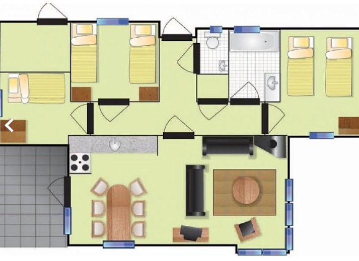 Gemuetliches Wohnzimmer der DUINVILLA 6 in Hollum, Ameland, mit bequemen Sitzgelegenheiten und viel Licht.