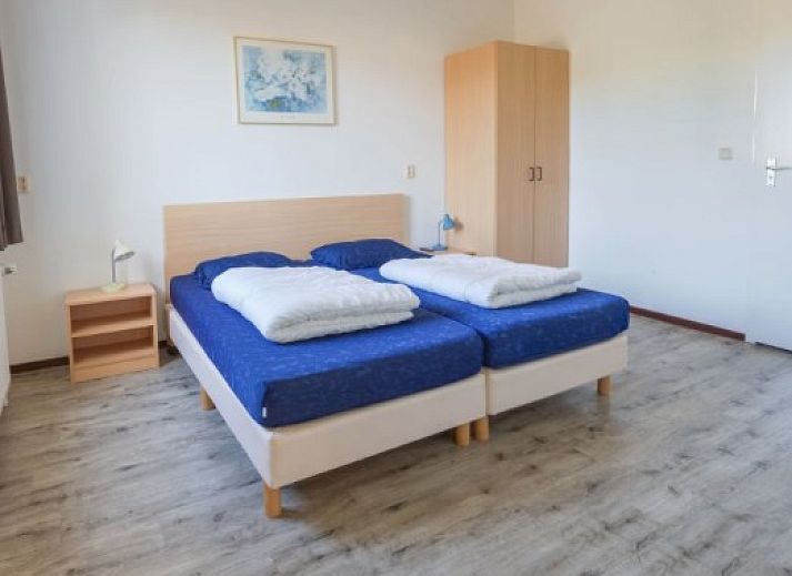 Zonnig terras bij DUINBUNGALOW 10 in Hollum, Ameland, ideaal vakantiehuis op de Waddeneilanden.