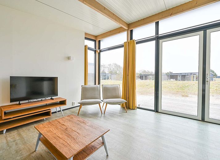 Aerial view of Detached house in Hollum, Ameland amid other vacation homes on the Wadden Islands.