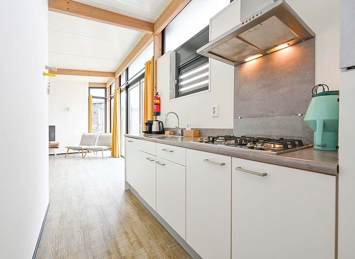 Side view of Detached house in Hollum, Ameland with spacious porch and views of the nature of the Wadden Islands.