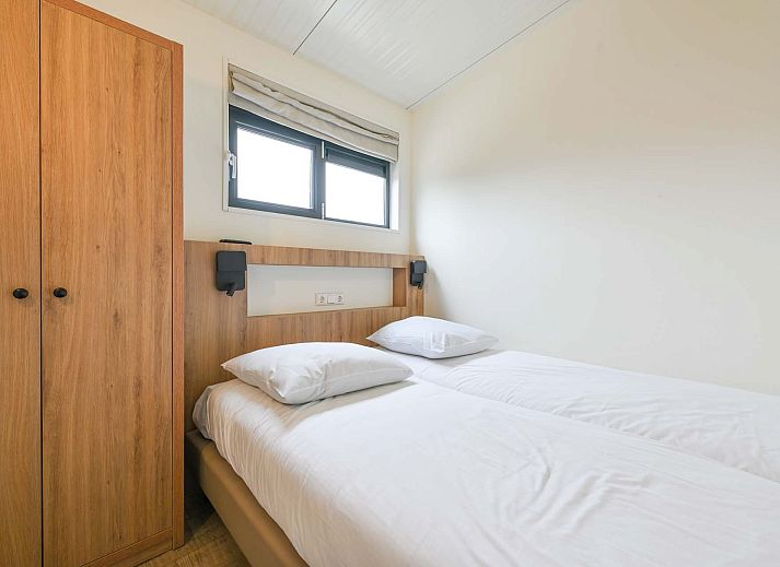 Side view of Detached house in Hollum, Ameland with spacious porch and views of the nature of the Wadden Islands.