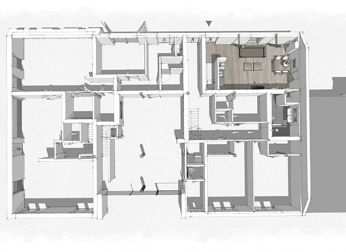 Moderne Essecke in der Wohnung Dorsvloer, Hollum, Ameland, mit Industrielampe und bunten Blumen.