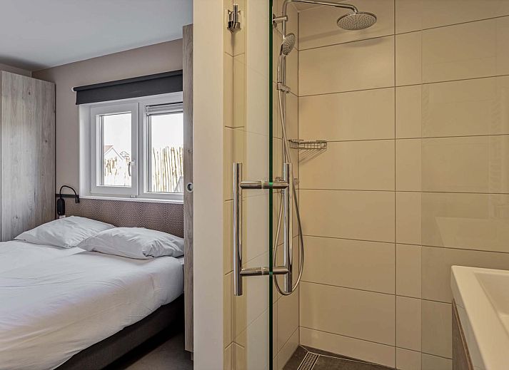 Veranda mit Naturblick im Ferienhaus in Hollum, Ameland, Watteninseln.