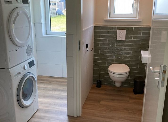 Uitzicht op weiland vanuit Zonnehoeve- zonnewende vakantiewoning in Hollum, Ameland.