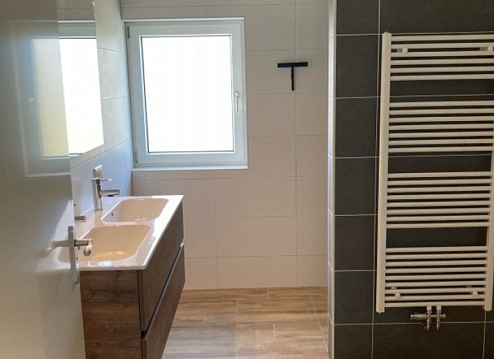 Uitzicht op weiland vanuit Zonnehoeve- zonnewende vakantiewoning in Hollum, Ameland.