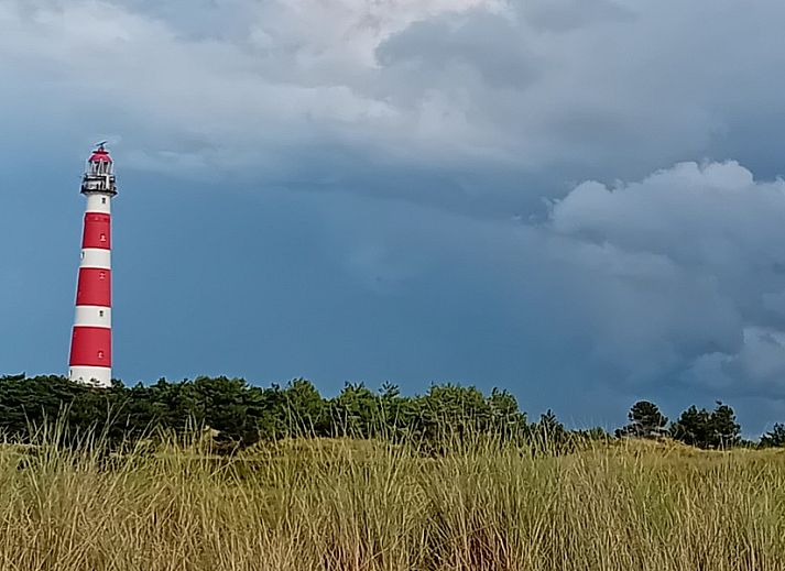 Authentischer Kamin mit Kacheln im Ferienhaus Anno 1618, Hollum, Ameland fuer eine warme Atmosphaere.