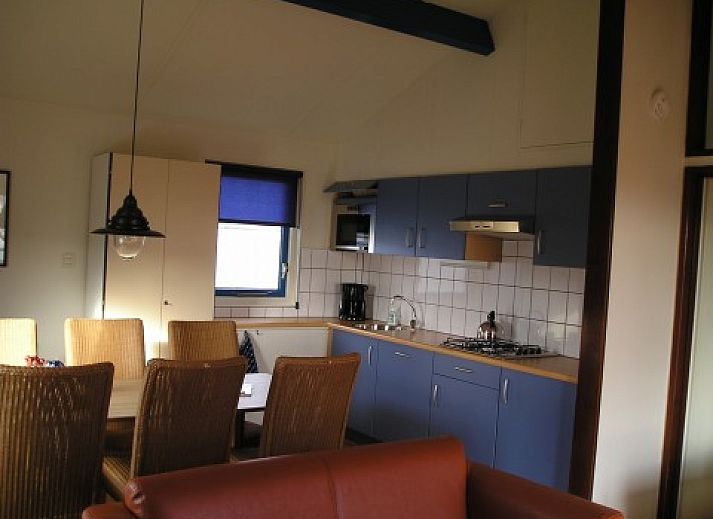 Kleefkruid Bungalow in Hollum, Ameland, umgeben von grner Natur und Ruhe.