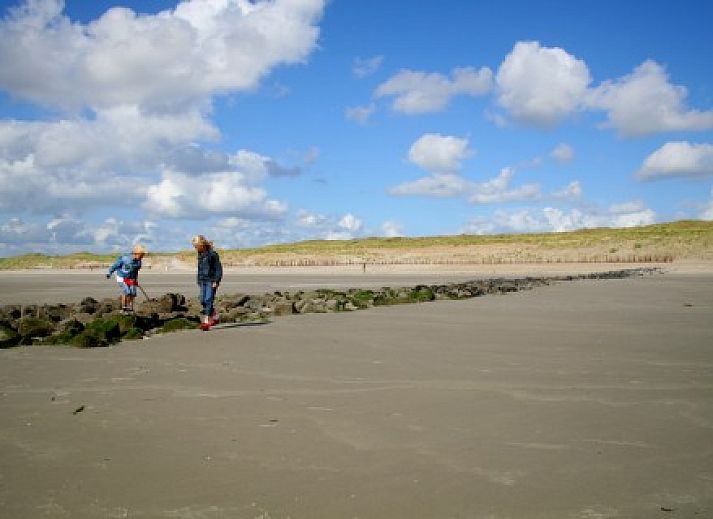 Kleefkruid Bungalow in Hollum, Ameland, umgeben von grner Natur und Ruhe.