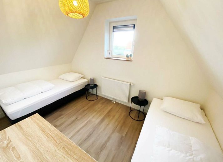 Stijlvolle woonkamer van De Miede appartement in Nes, Ameland.