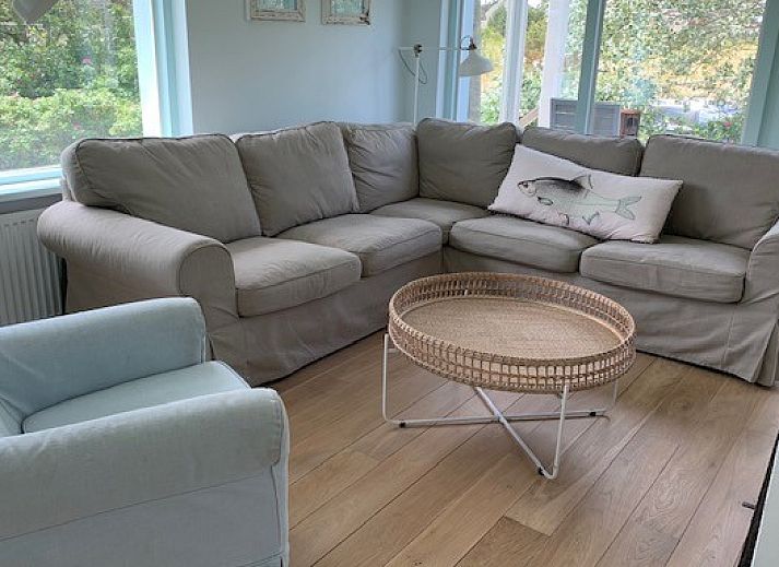 Vakantiehuis Zout in Buren, Ameland met rieten dak en tuin.