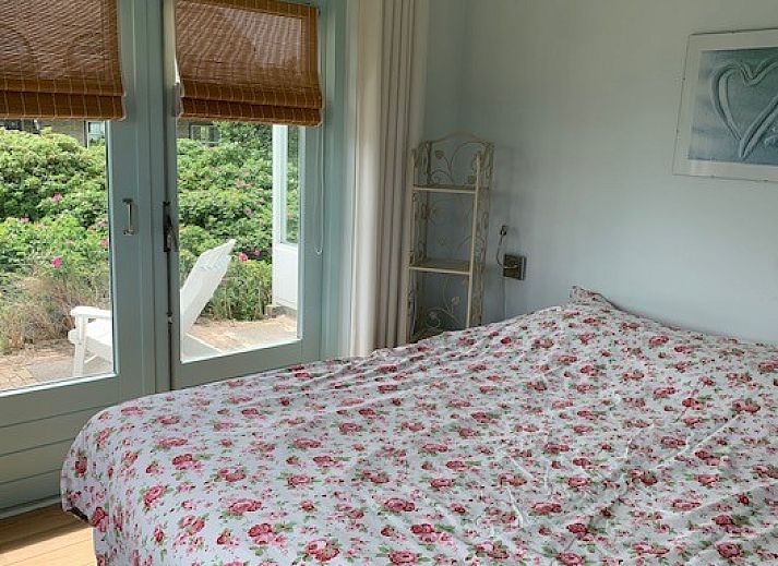 Gezellig terras bij Zout vakantiehuis in Buren, Ameland met decoraties.