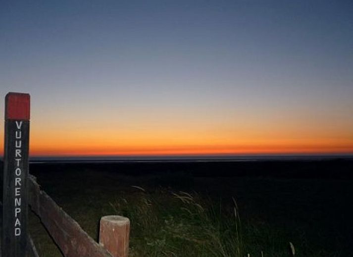 Gemtliches Wohnzimmer des Ferienhauses Schier in Schiermonnikoog, Watteninseln, mit bequemer Sitzecke.