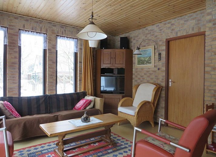 Vakantiehuis Duinrust in Schiermonnikoog met charmante buitenruimte en groene omgeving.