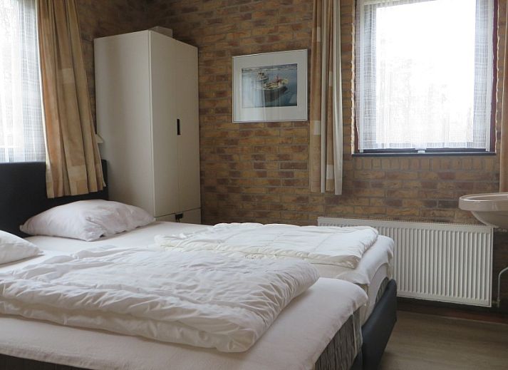Vakantiehuis Duinrust in Schiermonnikoog met charmante buitenruimte en groene omgeving.