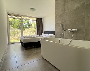 Unterkunft 01011034 - Ferienhaus Texel - Luxe 8 persoons &#8216;Golf Villa Texel&#8217; vlakbij zee