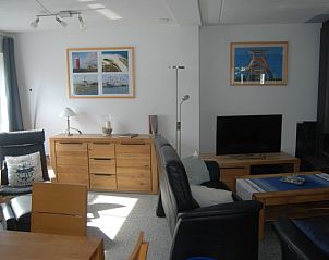 Comfortabele zithoek in De Krim 641 vakantiehuis, De Cocksdorp Texel met moderne inrichting.