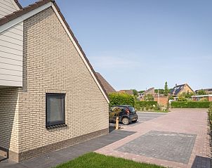 Seitenansicht von Typ B-12 Hodshonstraat, Ferienhaus in De Cocksdorp, Texel, mit Blick auf die ruhige Umgebung.