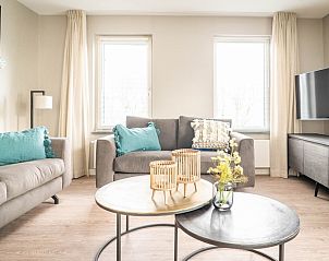 Stilvolle Sitzecke in Typ B-12 Hodshonstraat, Ferienhaus in De Cocksdorp, Texel, mit dekorativen Details.